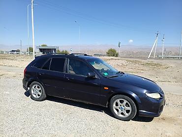 бишкек авто салон: Mazda 323: 2002 г., 2 л, Автомат, Бензин, Хетчбек — 9