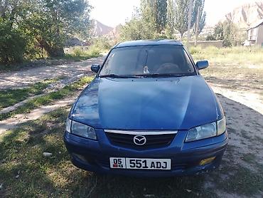 чехол на мопед: Mazda 626: 2000 г., 1.8 л, Механика, Бензин, Лифтбек — 1