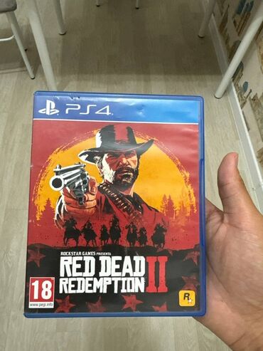 диск на плейстейшн: Игра Red Dead Redemption II — версия для PlayStation 4 (диск в
