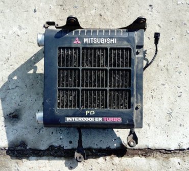 Передние фары: Масляный радиатор Mitsubishi 1998 г., Б/у, Оригинал, Япония