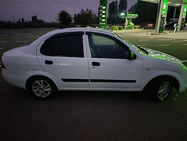 uaz satisi: Saipa Tiba sedan – ağ rəng Əsas xüsusiyyətlər: - Kuzov: 4 qapılı — 8