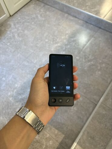 sentir: Bu cihaz — iFLYTEK Smart Translator adlanır 60 dili dəstəkləyən