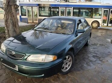 срочно продаю в связи с переездом: Mazda 626: 1997 г., 2.5 л, Механика, Бензин, Седан
