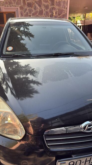 Hyundai: Hyundai Accent: 1.4 l | 2009 il Sedan — 11