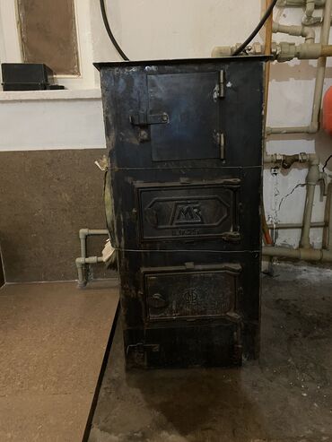 печки для отопления дома: Угольная печка 120кв. Б/у