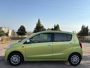 Daihatsu Cuore: 2008 г., 1 л, Механика, Бензин, Хэтчбэк — 4