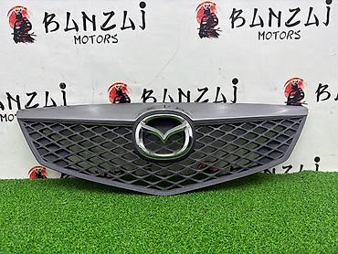ноускат демио: Решетка радиатора Mazda 2005 г., Б/у, Оригинал — 2