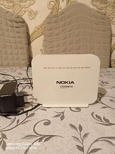 wifi modem nokia: Nokia ev/ofa internet routeri - Brend: Nokia - Ağ rəngli, stolüstü — 1