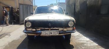 24 volqa: Model: GAZ Volga (GAZ-24 seriyası) Kuzov: sedan, ağ rəng Nömrə nişanı — 5