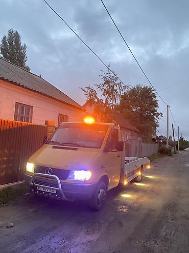Услуги эвакуатора: С лебедкой, С ломаной платформой, С жёсткой сцепкой — 10