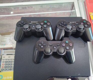 sony playstation 2: Ideal veziyyetdedir evde iwlenilib 3 pultu var 2 si tezedi 500 GB 5