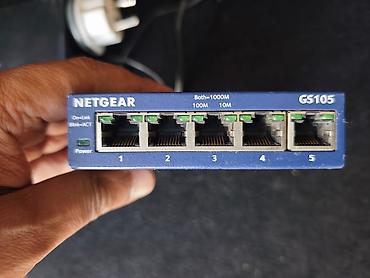 Модемы и сетевое оборудование: NETGEAR ProSAFE GS105 — неуправляемый гигабитный хаб/коммутатор на 5 — 3