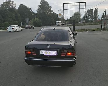 sarı ford transit: Mercedes‑Benz E‑Class (W210) sedan - Korpus: qara rəng, 4 qapı, xrom — 2