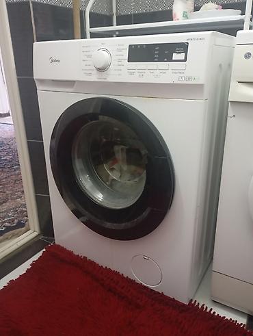 60: Стиральная машина Midea MFN70-S1403, фронтальная загрузка. Основные — 1