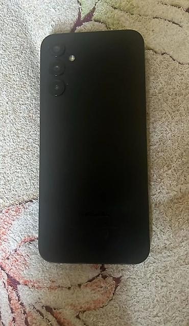 dubayski iphone 14 pro max: Məhsul: Qara rəngli smartfon Xüsusiyyətlər: - Arxa panel: mat qara — 1