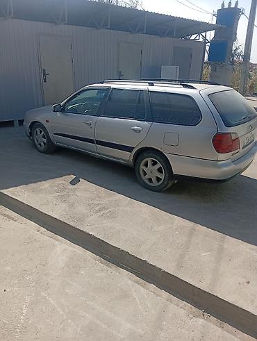 талисман машина: Nissan Primera: 2001 г., 1.8 л, Механика, Бензин, Универсал — 1