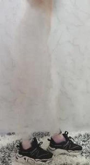 Helanke, biciklistički šortsevi: Ženske helanke tamne boje sa rebrastom teksturom. Karakteriše ih visok — 24