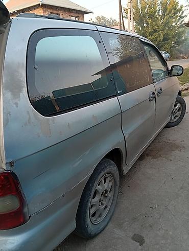 lider auto: Kia Carnival: 1998 г., Минивэн — 10