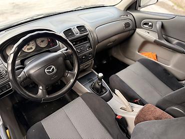 Mazda: Mazda 323: 2003 г., 1.6 л, Механика, Бензин, Универсал — 15