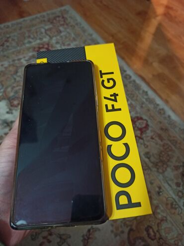 Мобильные телефоны: Poco F4 GT, 256 ГБ, цвет - Черный, 1 SIM