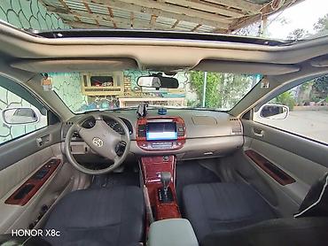 sirvan masin: Toyota Camry: 3 l | 2005 il Sedan — 7