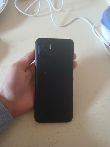 телефон fly fs526 power plus 2: Xiaomi Mi A1, 32 ГБ, цвет - Черный, 
 Сенсорный, Отпечаток пальца, Face ID