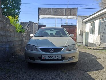 Mazda: Mazda 323: 2002 г., 1.6 л, Механика, Бензин, Седан