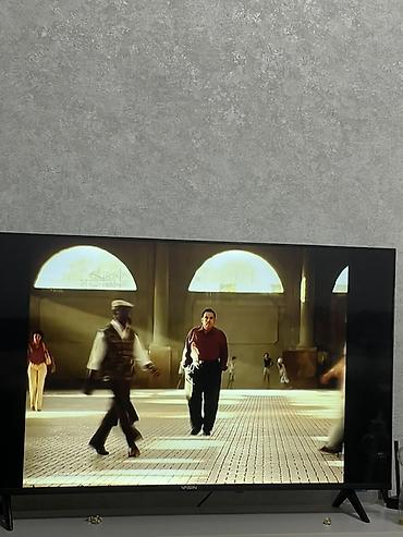 Телевизор VISION, диагональ экрана примерно 43–50". - Тонкие рамки