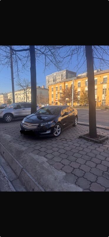 переходник электромобиль: Электромобиль Chevrolet Volt 2011, выполненный в черном цвете, есть