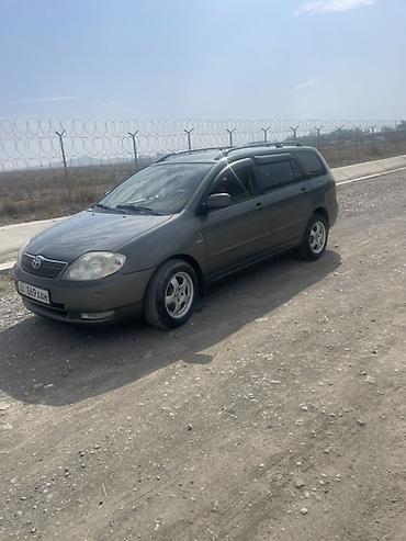 Toyota: Toyota Corolla: 2003 г., 1.4 л, Кол менен иштөөчү, Бензин, Универсал — 5