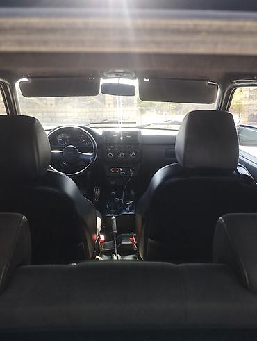 niva sidenya: Lada Niva 4x4, qara rəngdə, 3 qapılı ofrout tipli SUV. Əsas — 1