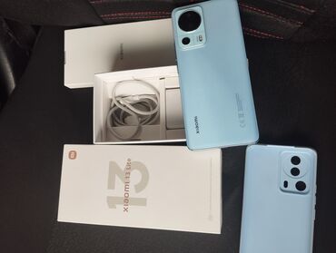 adapter xiaomi: Xiaomi 13 Lite, 
 Zəmanət, Kredit, Sensor