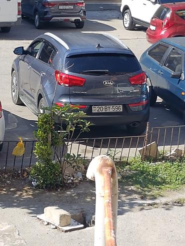 kia cerato manitoru: Kia Sportage (III nəsil) krossover - Kuzov: tünd-boz rəng, 5 qapı - — 2