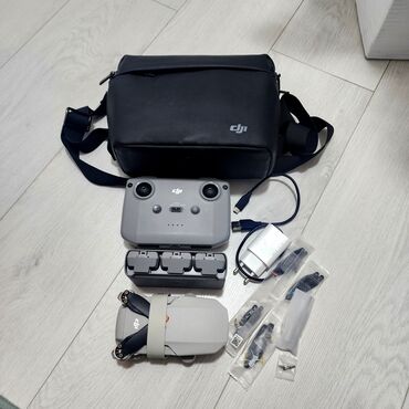 миний телефон: DJI Mini 2 Fly More Combo — компактный квадрокоптер с камерой 4K и