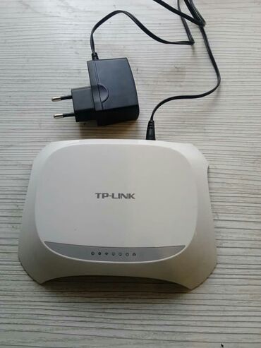 Модемы и сетевое оборудование: Wi-Fi роутер TP-Link модель WR-720 N ( Aknet,MegaLine, HomLine, Saima