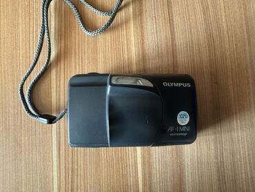 fotoapparat olympus: Продается пленочный фотоаппарат Olympus AF-1 mini. В отличном