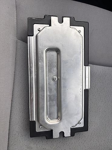 h55be7000: BMW modul / upravljačka jedinica za elektroniku vozila. Na nalepnici — 2