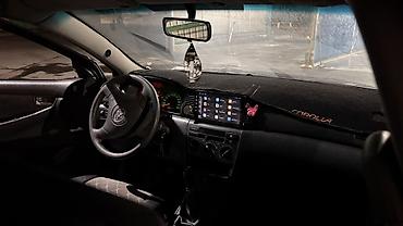 тайота корола 2006: Toyota Corolla: 2003 г., 1.4 л, Механика, Бензин, Кроссовер — 5