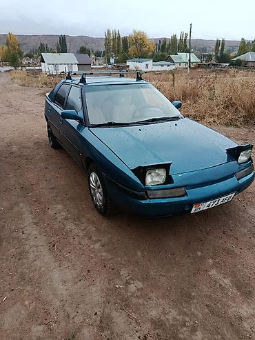 Mazda: Mazda 323: 1992 г., 1.6 л, Кол менен иштөөчү, Бензин, Хетчбек — 1