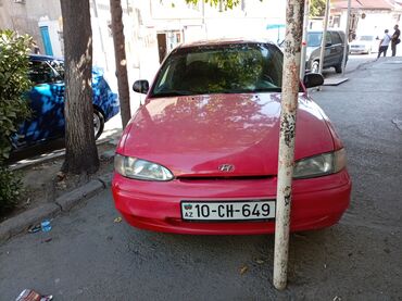 Yağlar və avtokimyəvi maddələr: Hyundai Accent sedan – qırmızı rəngli, 4 qapılı şəhər avtomobili