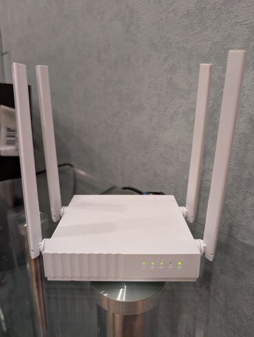 купить вай фай роутер бишкек: Wi‑Fi роутер TP‑Link (модель из серии Archer/AX, белый корпус) с 4