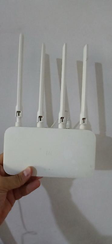 modem xiaomi 4g: Xiaomi Mi Router 4C (Model: R4CM) - 2.4 GHz Wi‑Fi marşrutlayıcı, 4 — 1