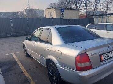 Mazda: Mazda Familia: 1998 г., 1.3 л, Автомат, Бензин, Седан