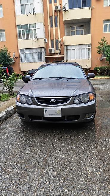 avto karavan: Kia Cerato: 1.8 l | 2002 il Sedan — 1
