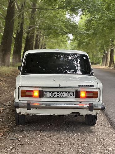 yan güzgülər s: VAZ 2106 sedan – klassik sovet modeli, ağ rəng. Karopka 4 işləy — 2