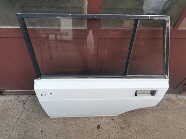 Auto delovi: Vrata zadnja leva Lada 2104 Karavan(bela)ZL3. Skinuta sa rastavljenog — 3