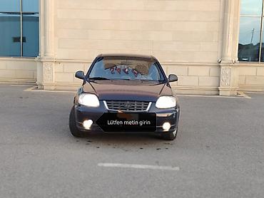 disk masin: Hyundai Accent sedan - Kuzov: 4 qapılı sedan, tünd mavi rəng - — 1