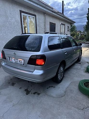 07 oturacaqlar: Nissan Primera Wagon – gümüş rəng, universal kuzov Xüsusiyyətlər: - — 3
