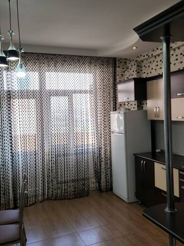 Uzunmüddətli kirayə mənzillər: Nərimanov metrosu, 82 N-li məktəb yanı, Yeni Tikili 18 mərtəbəli — 8