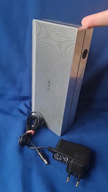 Zvučnici i stereo sistemi: Loewe Speaker 2go – prenosni Bluetooth zvučnik sa punjačem - — 2